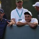 Rory McIlroy and Ludvig Aberg wait on the 17th tee late on the second day of the BMW PGA Championship at Wentworth Club. Picture: Richard Heathcote/Getty Images.