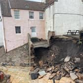 This is the scene in the Fife fishing village of Pittenweem after a sea wall and shared walkway leading to iconic historical properties gave way after being battered by waves during recent exceptionally high tides