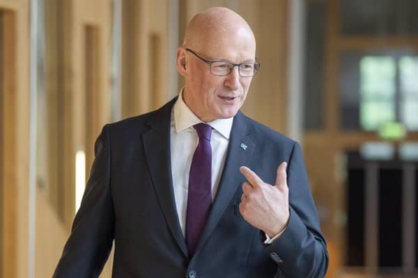 John Swinney arrives for First Minister's Questions at the Scottish Parliament in Holyrood, Edinburgh. Photo: Jane Barlow/PA Wire