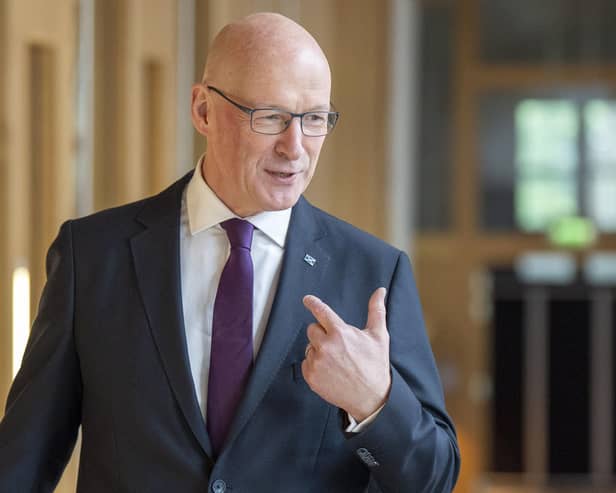 John Swinney arrives for First Minister's Questions at the Scottish Parliament in Holyrood, Edinburgh. Photo: Jane Barlow/PA Wire