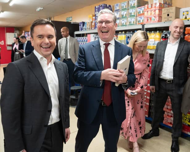 Labour leader Sir Keir Starmer (right) tours an Iceland supermarket in Warrington with executive chairman of the food chain, Richard Walker (left). Picture: Stefan Rousseau/PA Wire