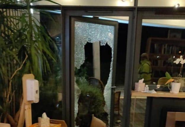 Glass doors in the building were smashed.