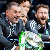 Celtic manager Ange Postecoglou lifts the Viaplay Cup trophy after a 2-1 win over Rangers.