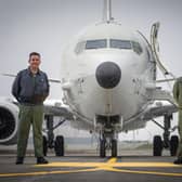 Group Captain Chris Layden station commander (left) and Wing Commander James Hanson, in front of the first of the Poseidon MRA1 plane, intended for submarine-hunting and the tracking of maritime targets, to arrive at RAF Lossiemouth, Moray