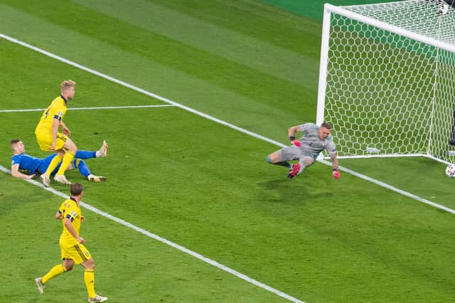 Ukraine's Artem Dovbyk (centre) makes it 2-1 against Sweden in the last minute of extra time to book a quarter-final clash with England in Rome  (Photo by Ross Parker / SNS Group)