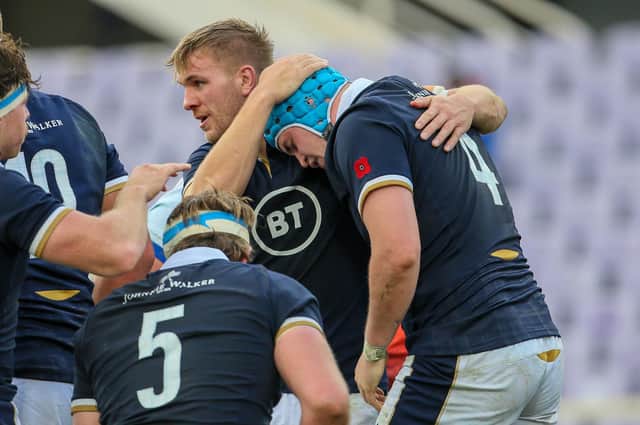 Chris Harris congratulates Scott Cummings on his second-half try in Scotland's 28-17 win over Italy in the Autumn Nations Cup in Florence. Picture: Giampiero Sposito/Getty Images