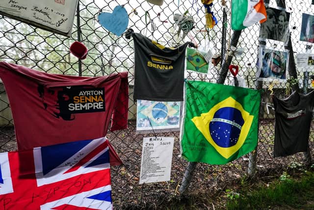 Tributes to Ayrton Senna are attached to the fence beside his memorial statue at the Autodromo Internazionale Enzo e Dino Ferrari.Photo: David Davies/PA Wire.