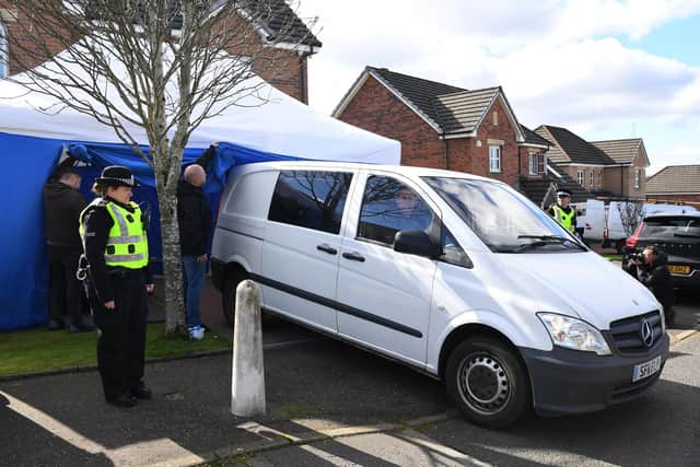 A police vehicle reverses into a tent outside the home of Peter Murrell, former chief executive of the Scottish National Party (SNP), and his wife, former First Minister Nicola Sturgeon (Picture: Andy Buchanan/AFP via Getty Images)