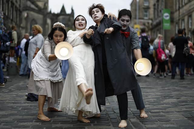 Street entertainers perform on Edinburgh's Royal Mile during the city's Festival Fringe in 2023. Picture: Jeff J Mitchell/Getty Images
