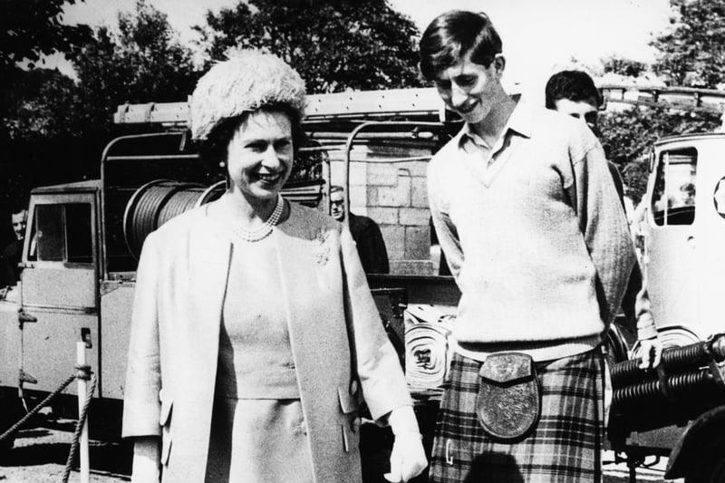 Prince Charles, who was head boy at Gordonstoun School, with the Queen at the school as she opened their new sports centre in July 1967.