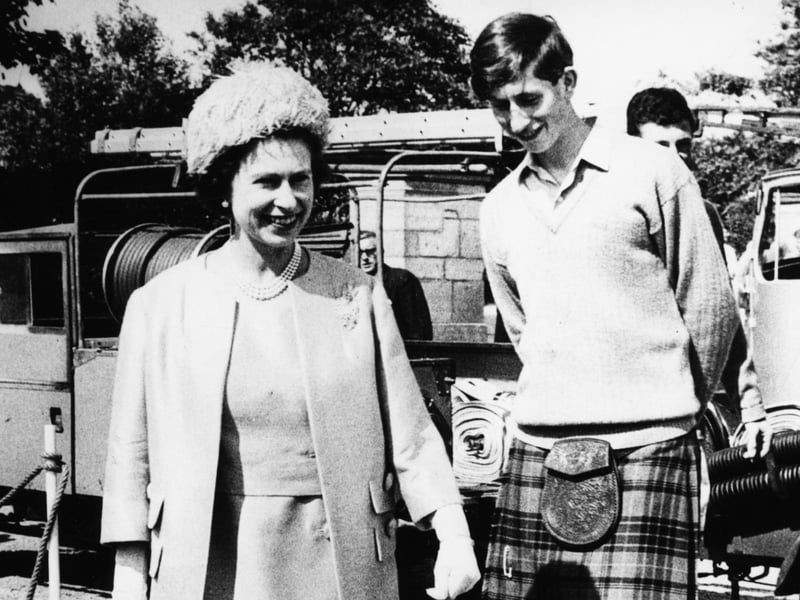 Prince Charles, who was head boy at Gordonstoun School, with the Queen at the school as she opened their new sports centre in July 1967.