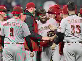 Cincinnati Reds pitcher Wade Miley, centre, is congratulated by teammates after he pitched a no-hitter against the Cleveland Indians. Picture: Tony Dejak/AP
