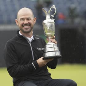 American Brian Harman shows off the Claret Jug after his stunning six-shot success in the 151st Open. Picture: Tom Russo/The Scotsman.