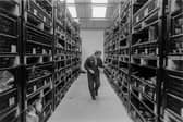 Donald (Noe) Smith at the yarn store, in Kenneth Macleod, Shawbost Ltd, from ‘Harris Tweed 1992’ by documentary photographer Jeremy Sutton-Hibbert.