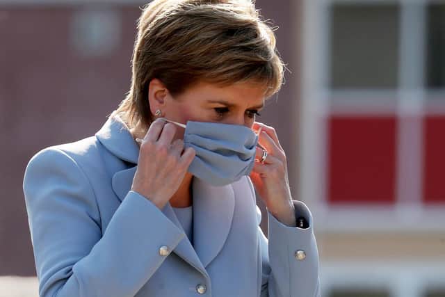 Scotland's First Minister Nicola Sturgeon urges sensible precautions despites relaxation on Monday.  Picture: Russell Cheyne/WPA Pool/Getty Images
