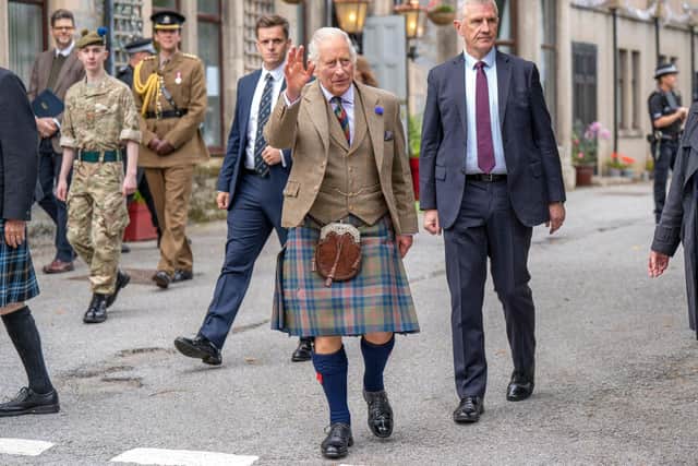 King Charles III in Tomintoul. The peatland restoration on the Delnadamph Estate is being undertaken by a mix of private and public cash. (Photo by JANE BARLOW/POOL/AFP via Getty Images)
