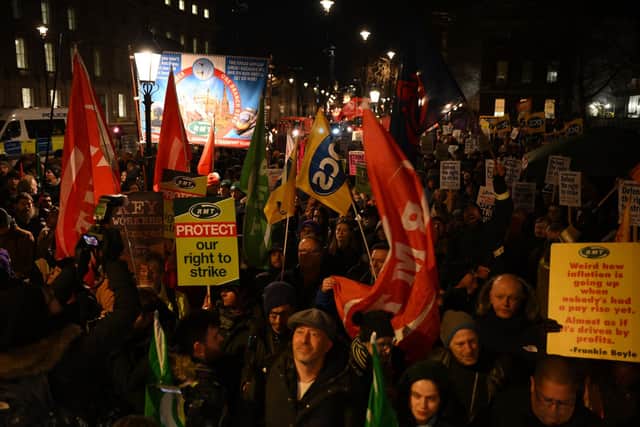 Demonstrators protest at Downing Street against the government's bill on minimum service levels during strikes