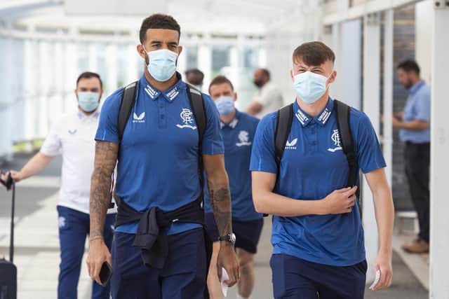 Connor Goldson (left) and Nathan Patterson depart Glasgow Airport as Rangers head to Armenia.