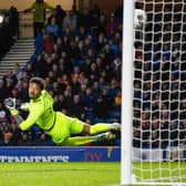 Abdallah Sima curls home Rangers' opening goal against Livingston at Ibrox. (Photo by Alan Harvey / SNS Group)