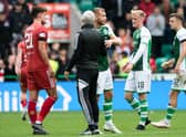 Aberdeen manager Jim Goodwin confronts Hibs defender Ryan Porteous after the 3-1 defeat at Easter Road.  (Photo by Paul Devlin / SNS Group)