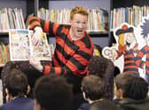 Olympic Gold Medallist, Greg Rutherford reads from the 'World's loudest ever comic strip', which is part of a World Book Day edition of the Beano, as part of the comic's 'Libraries Aloud' reading initiative in partnership with the National Literary Trust.