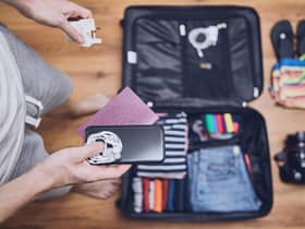 Try packing all wires together in zipped sections of your case to avoid tangles when you unpack. Pic: PA Photo/Alamy.