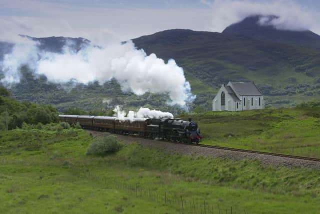 The Jacobite STEAM TRAIN  passing Polnish church near Lochailort on its first trip of the season on the Fort William to  Mallaig on the West Highland railway line. 
Pic Stephen Mansfield  19/6/2000
PUBDATE_TS_03_10_2000_06_20