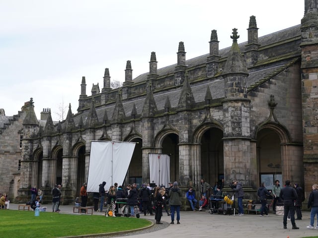 Cast and crew members on set as they film scenes for the next season of The Crown in St Andrews
