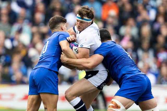 Scotland's Hamish Watson is tacklyed by France's Matthieu Jalibert and Paul Boudehent during last weekend's victory at Murrayfield.