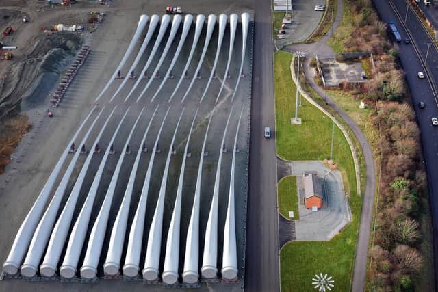 An aerial view shows wind turbine blades stored on the quayside ready for shipping at the Siemens Gamesa blade factory in Hull. Picture: Paul Ellis/AFP via Getty Images
