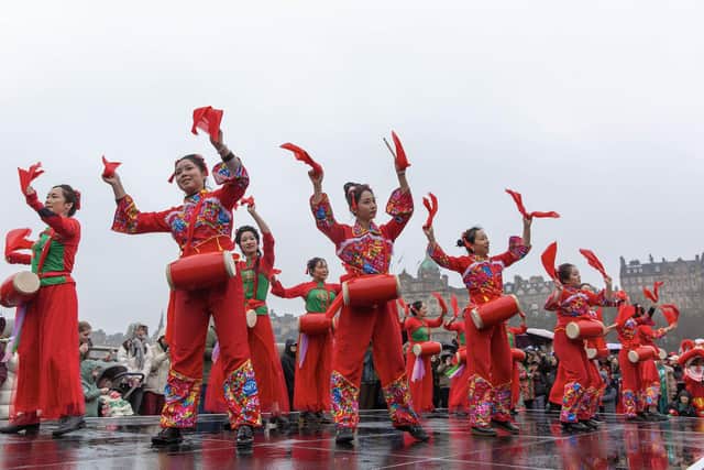 The Edinburgh Chinese Arts Association organise the annual Chinese New Year celebrations on The Mound.