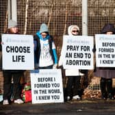 Campaigners who are against abortion protest outside Glasgow's Queen Elizabeth Hospital. Picture: John Devlin/JPIMedia