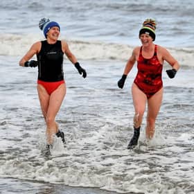 Two of my fellow swimmers braving the cold at Portobello yesterday. Picture: Jeff J Mitchell/Getty Images.
