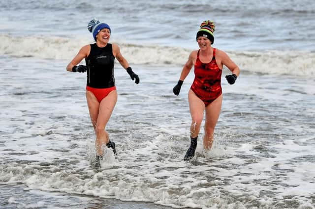 Two of my fellow swimmers braving the cold at Portobello yesterday. Picture: Jeff J Mitchell/Getty Images.