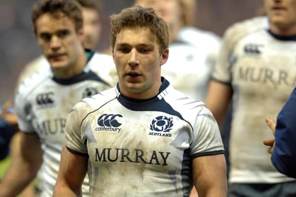 Chris Cusiter played for Scotland in a tough era. Here as captain he trudges off the field after a 2010 defeat to France.