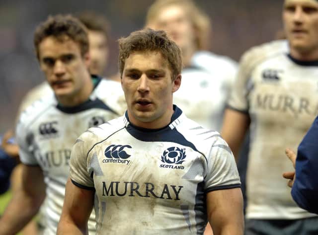 Chris Cusiter played for Scotland in a tough era. Here as captain he trudges off the field after a 2010 defeat to France.