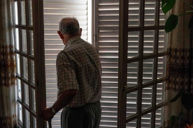 An elderly person closes his shutters to keep cool and avoid heatstroke during a heatwave in Clermont-Ferrand, France, in 2019 (Picture: Thierry Zoccolan/AFP via Getty Images)