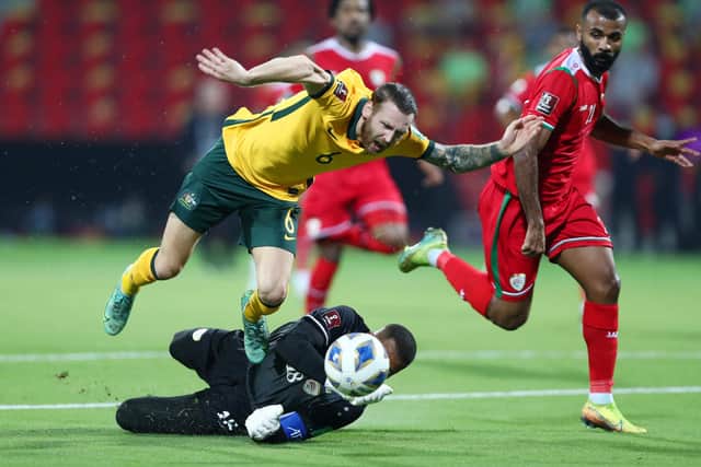 Martin Boyle earns a penalty for Australia after being fouled in the box by Oman goalkeeper Faiyz Issa Al Rusheidi during last month's World Cup qualifier in Muscat (Photo by Adil Al Naimi/Getty Images)