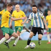 Lionel Messi of Argentina battles for possession with Kye Rowles of Australia during their FIFA World Cup Qatar 2022 round of 16 match. Photo by Michael Steele/Getty Images