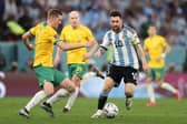 Lionel Messi of Argentina battles for possession with Kye Rowles of Australia during their FIFA World Cup Qatar 2022 round of 16 match. Photo by Michael Steele/Getty Images