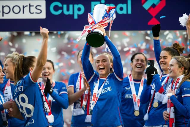 Rangers' Kirsty Howat lifts the trophy after the SWPL Sky Sports Cup final win over Hibs.  (Photo by Mark Scates / SNS Group)