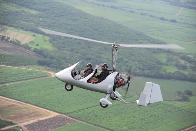 An example of a gyrocopter in flight.
