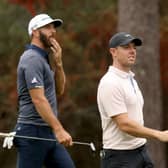 World No 1 Dustin Johnson and fifth-ranked Rory McIlroy walk together during a practice round prior to the Masters at Augusta National. Picture: Rob Carr/Getty Images