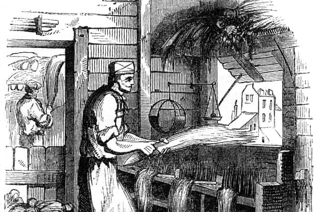A worker 'heckles' hemp in 1866. The word later became associated with barracking politicians and comedians (Picture: The Print Collector/Print Collector/Getty Images)