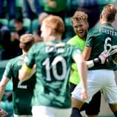 Hibernian goalkeeper Mark Oxley (left) celebrates his goal with team-mate Jordan Forster.