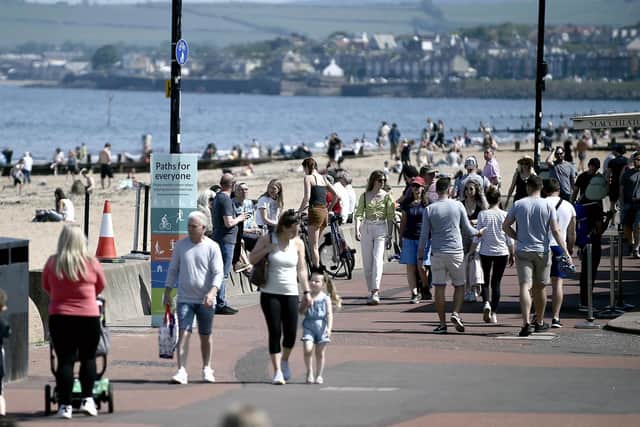Crowds of people flocked to Portobello Promenade in Edinburgh in the summer and some regrettably failed to stick to the social-distancing guidelines (Picture: Lisa Ferguson)