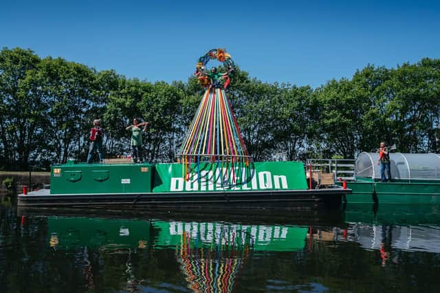 A floating garden on canal boats was created for the Dandelion project. Picture: Andrew Cawley