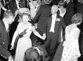 Queen Elizabeth II dances an eightsome reel at the Royal Company of Archers' Ball in the Assembly Rooms, Edinburgh, in 1966.