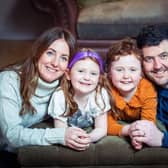 Eight-year-old Aurora Farren with her mother Jenna Farren, 34, brother Ada Farren 6 and father David Farren 41. Aurora overcame cancer and has been chosen to launch Cancer Research UK Race For Life in Scotland. Picture: Simon Price/Cancer Research UK/PA Wire