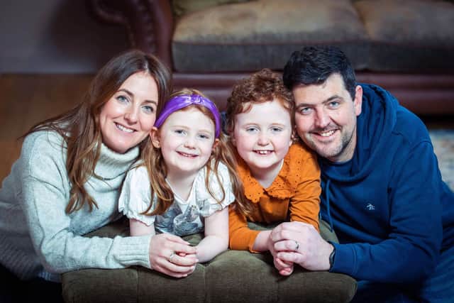 Eight-year-old Aurora Farren with her mother Jenna Farren, 34, brother Ada Farren 6 and father David Farren 41. Aurora overcame cancer and has been chosen to launch Cancer Research UK Race For Life in Scotland. Picture: Simon Price/Cancer Research UK/PA Wire